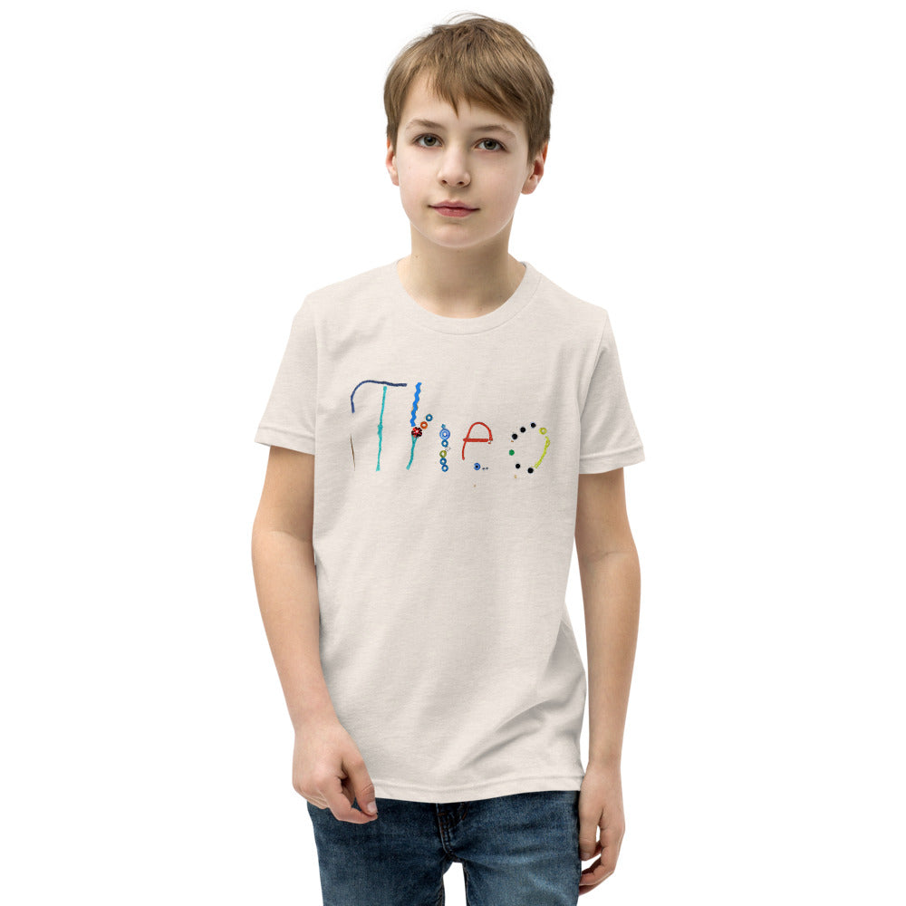 Theo 7 — Youth Staple Tee — Heather Dust (front)