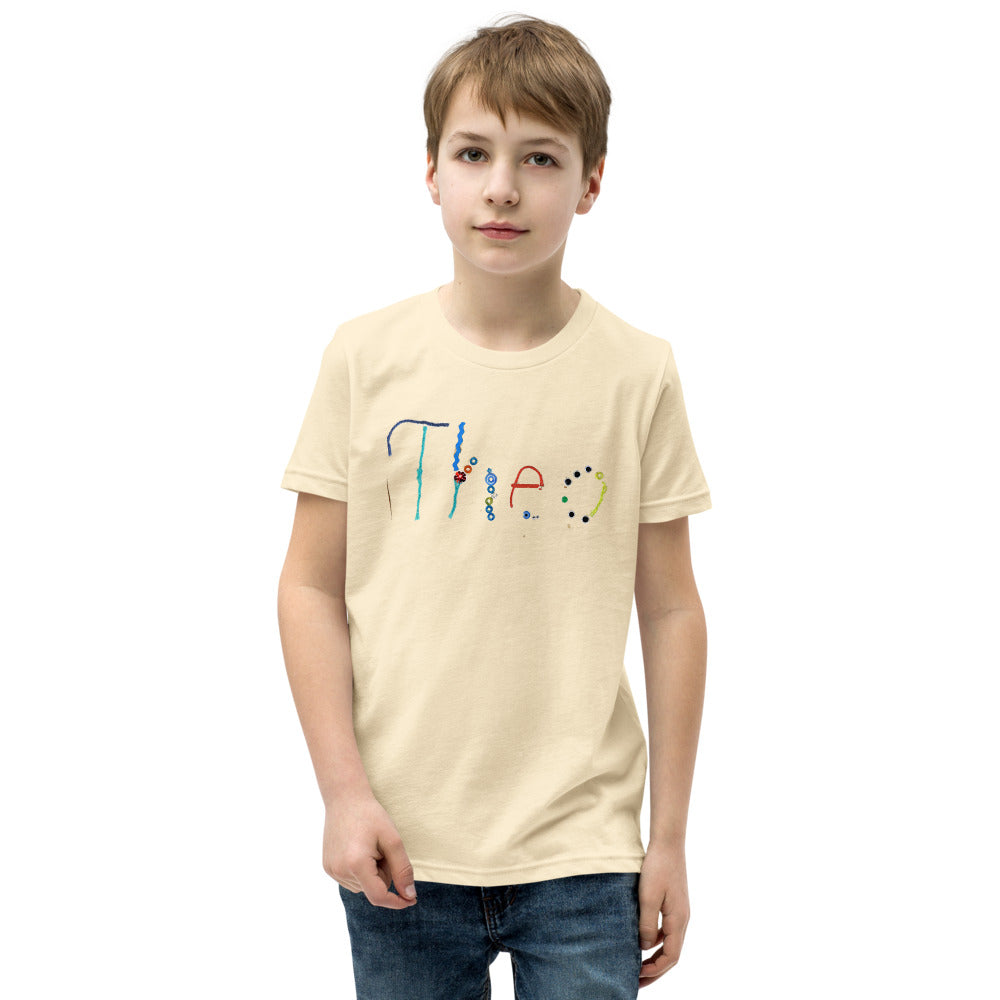Theo 7 — Youth Staple Tee — Natural (front)