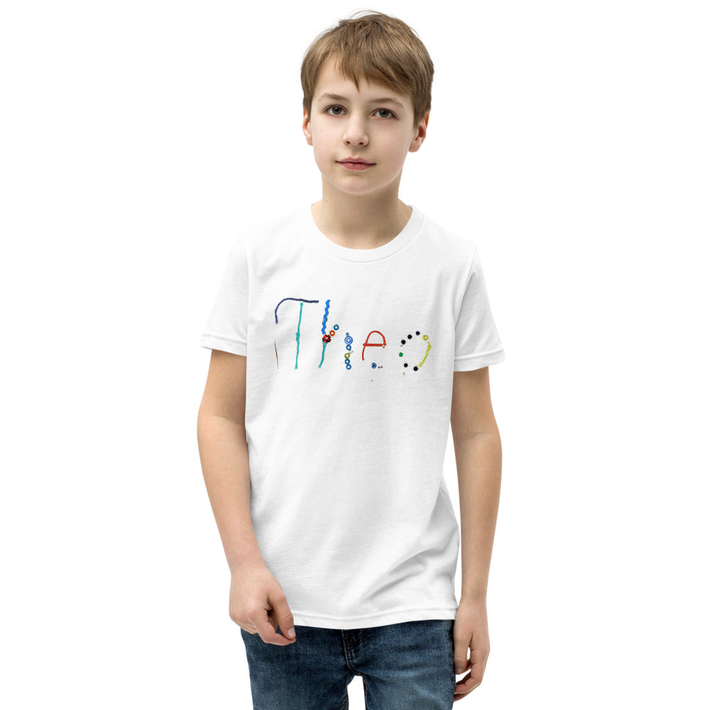 Theo 7 — Youth Staple Tee — White (front)